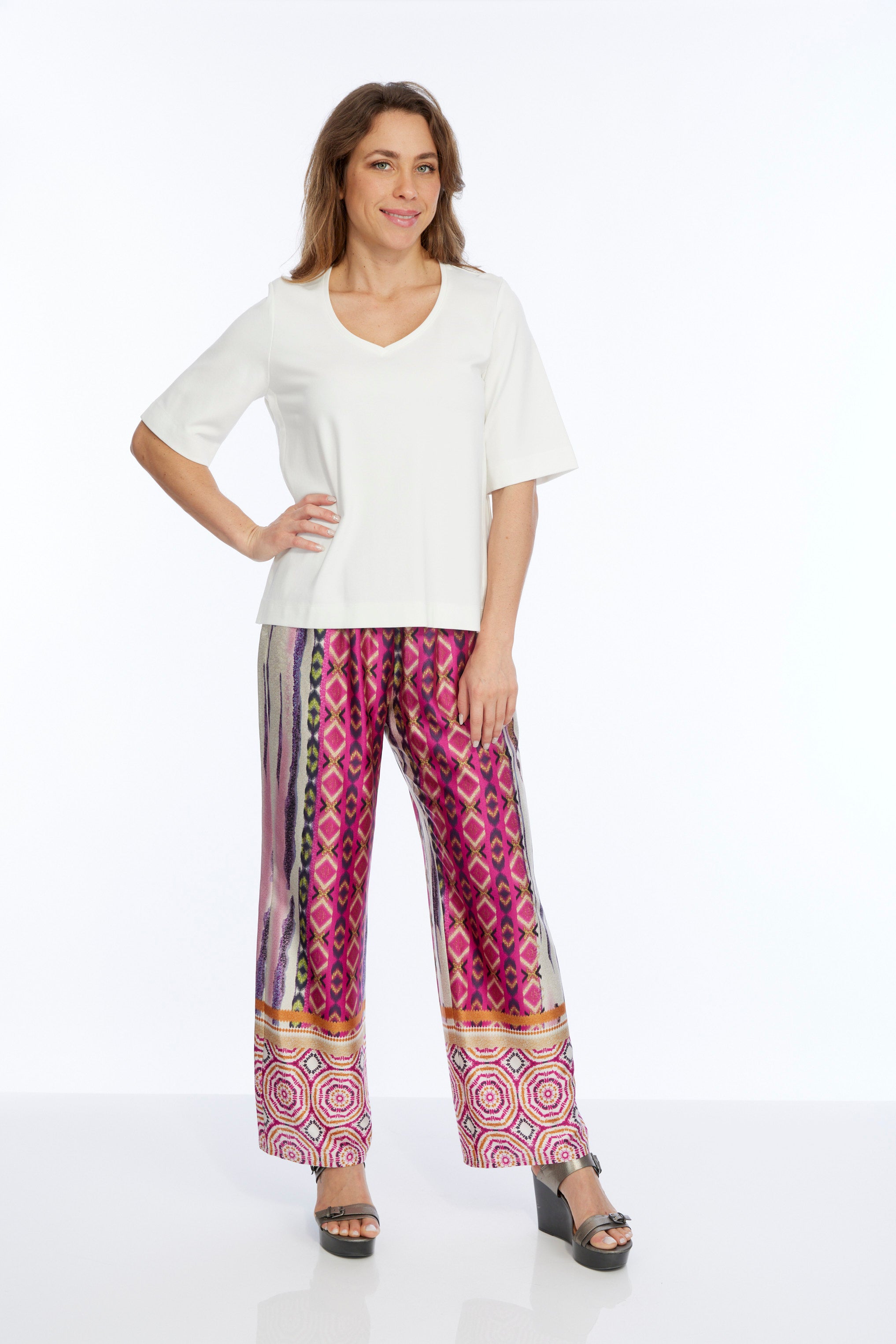 Stylish women's tribal print pull-on wide leg pants with bold, vibrant design