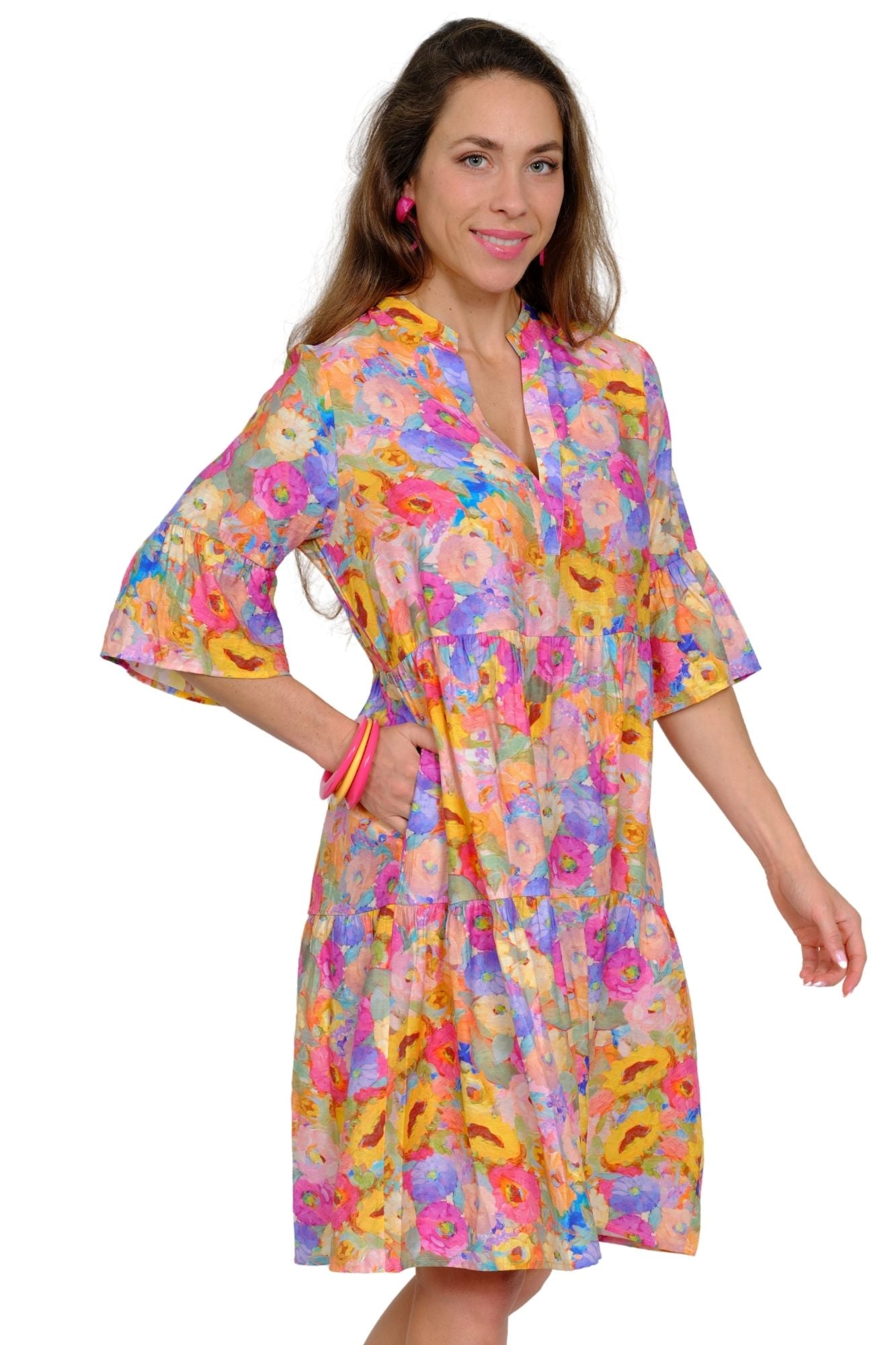 Bright floral summer dress for women with tiered skirt and boho-inspired silhouette