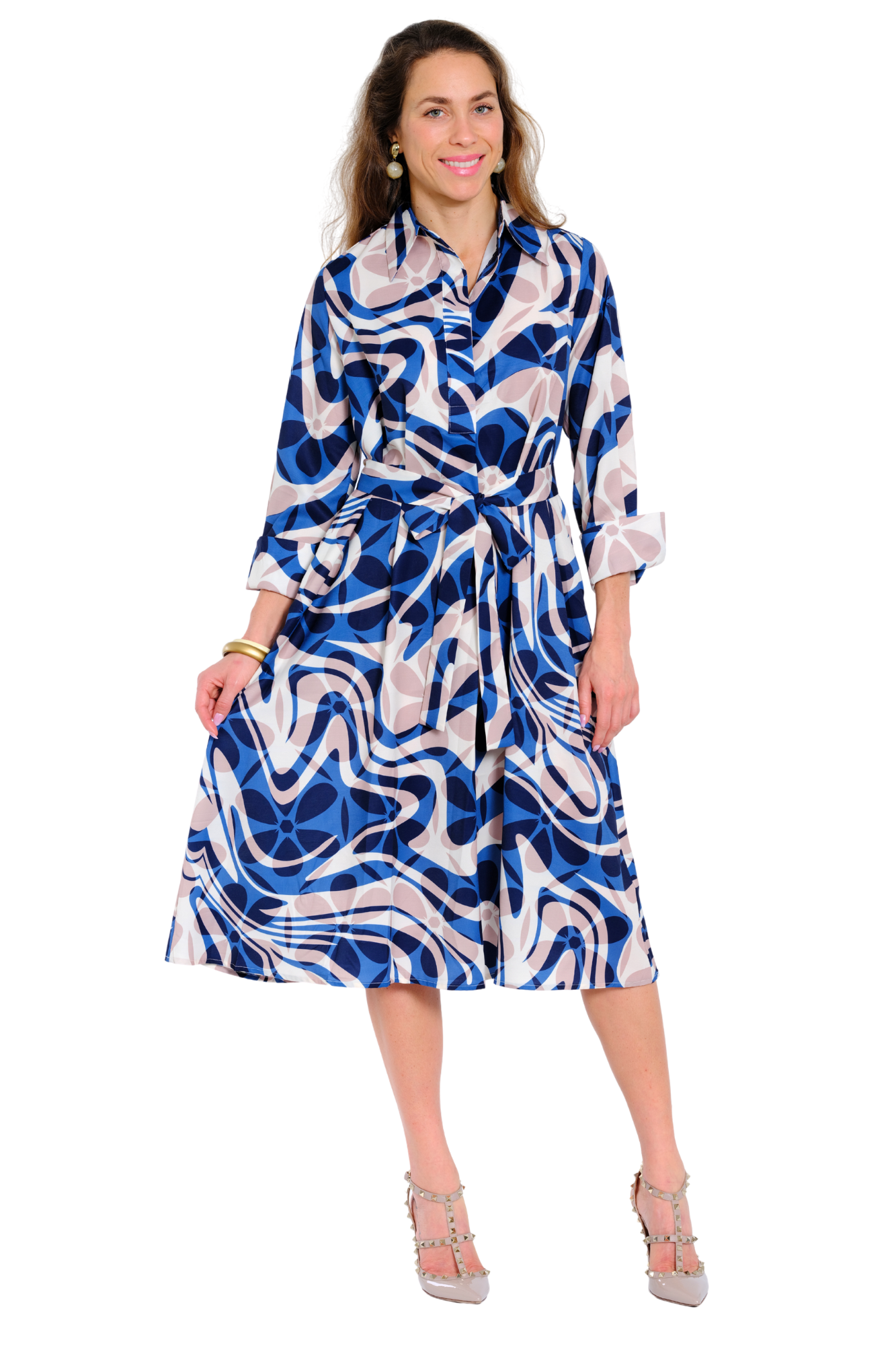 Women's blue long sleeve dress with blue and white swirl pattern and waist belt