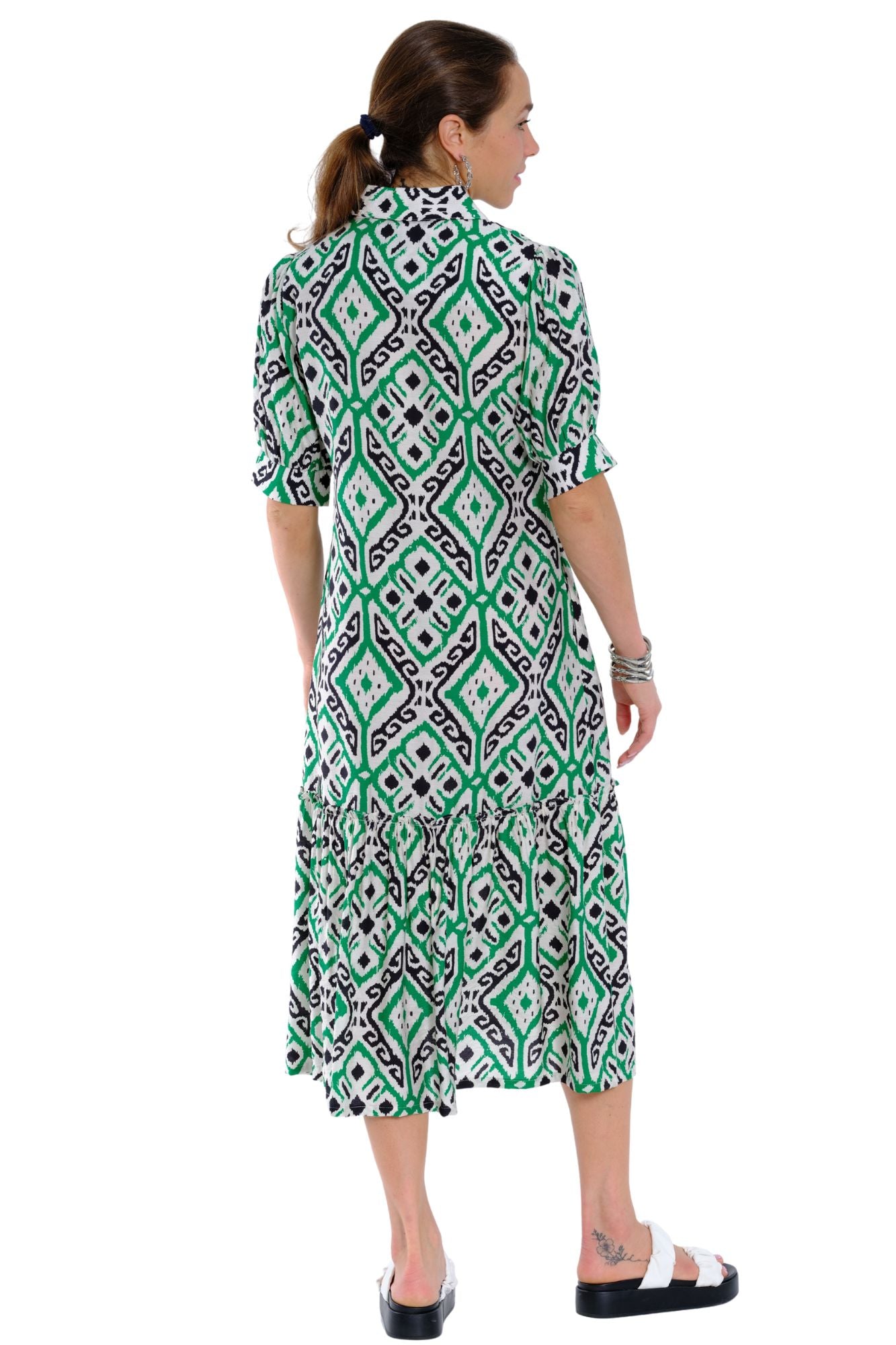 Women’s green and white patterned vacation dress with tiered hem