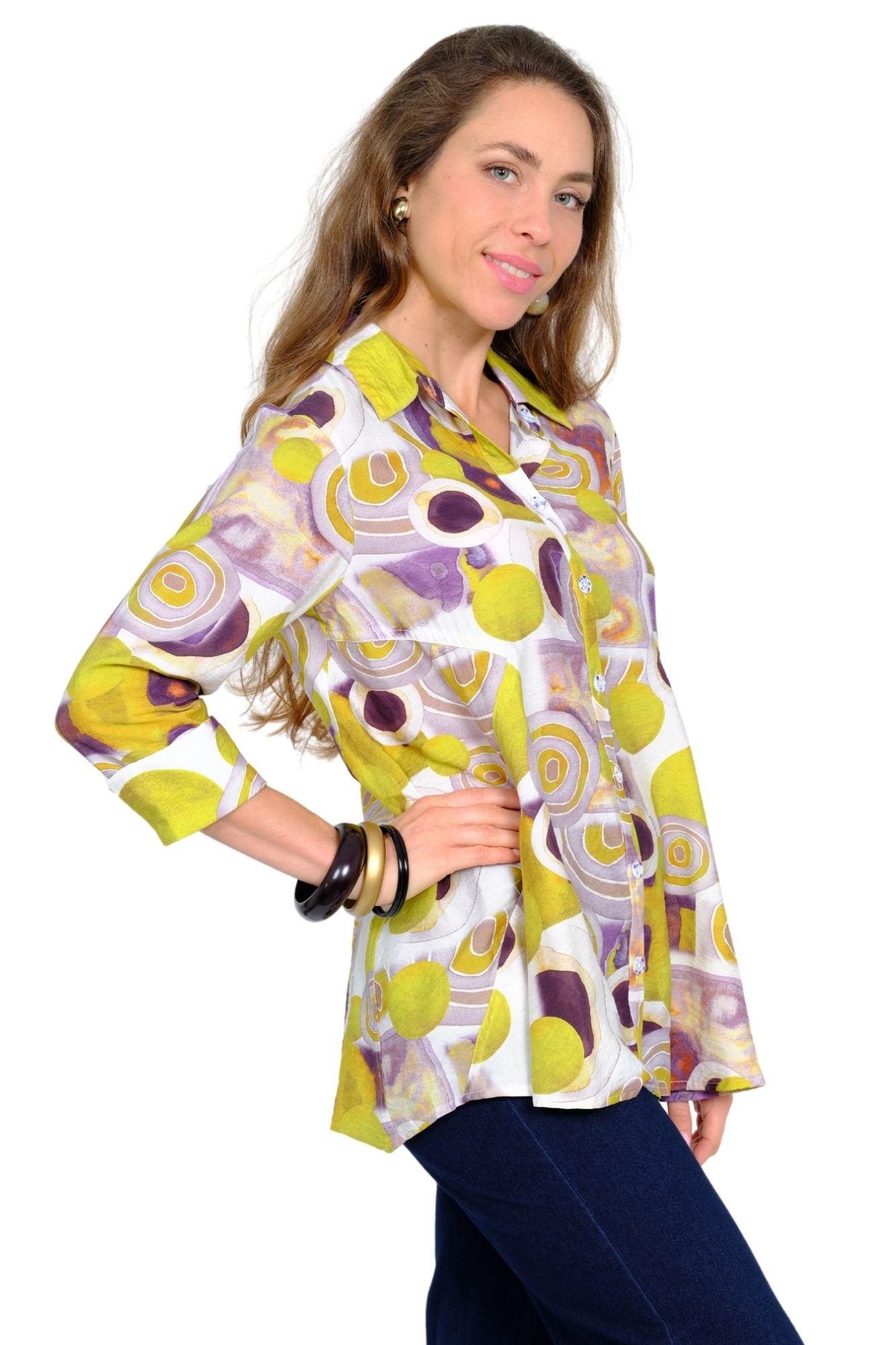 Abstract print women's tunic top with button down front and side pockets