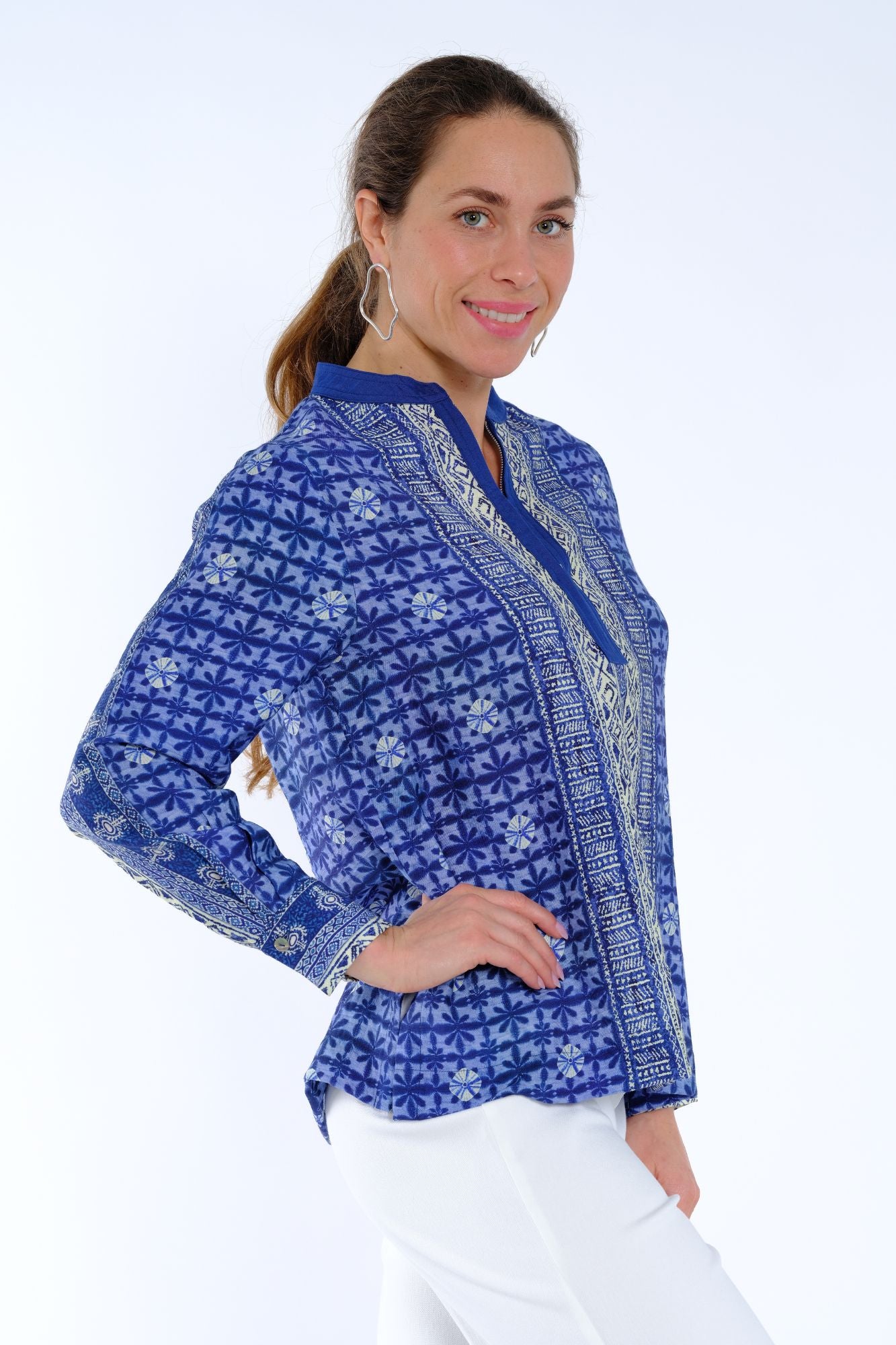 Printed women’s travel tunic top by LIOR with breathable fabric and flattering split neck